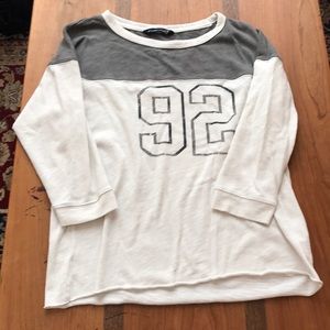 White and grey long sleeve shirt